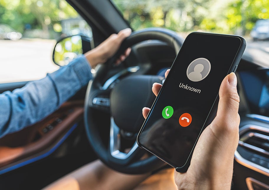 call from unknown caller on smartphone while in car