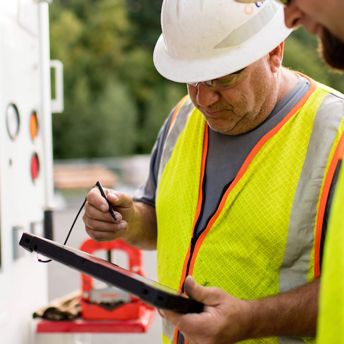 Unitil gas workers reviewing work orders