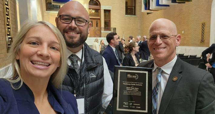 Mayor Samantha, Superintendent Jonathan, and Assistant Superintendent of finance & operations Jeremy pose with a 2025 Mass Save Climate Leader Award.