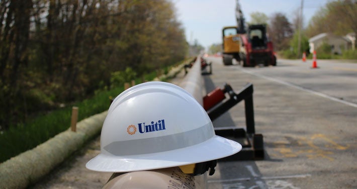 Unitil hard hat on natural gas pipeline