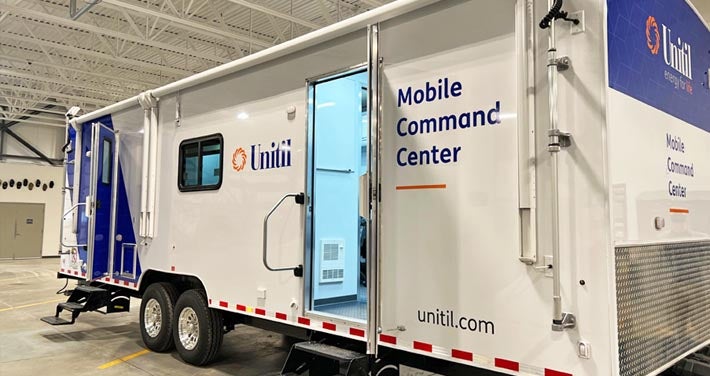 exterior of Unitil's new mobile command center in a large garage