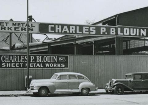 vintage photo of exterior of Charles P. Blouin office and plant