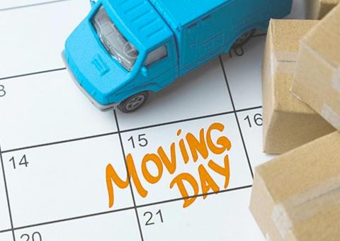 paper calendar with moving day highlighted
